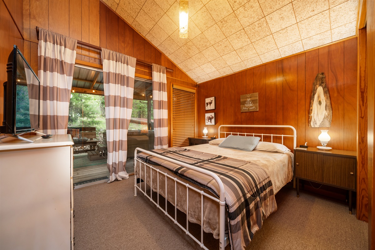 The hot tub awaits you just beyond the glass doors of either bedroom