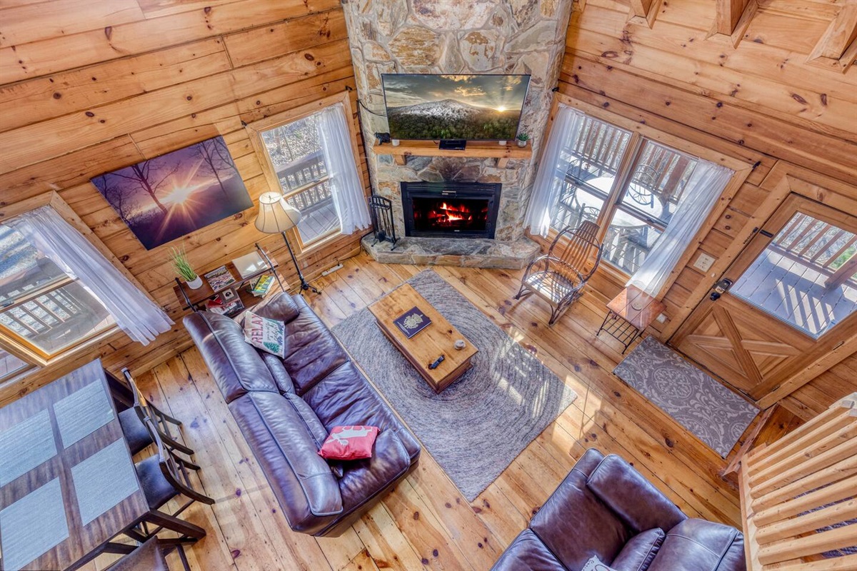 Family room with fire place.  Kitchen and dining area are also in the open living space.