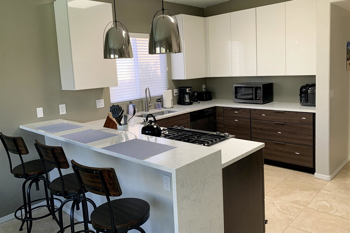 Modern kitchen is well equipped to make meal preparation easy.