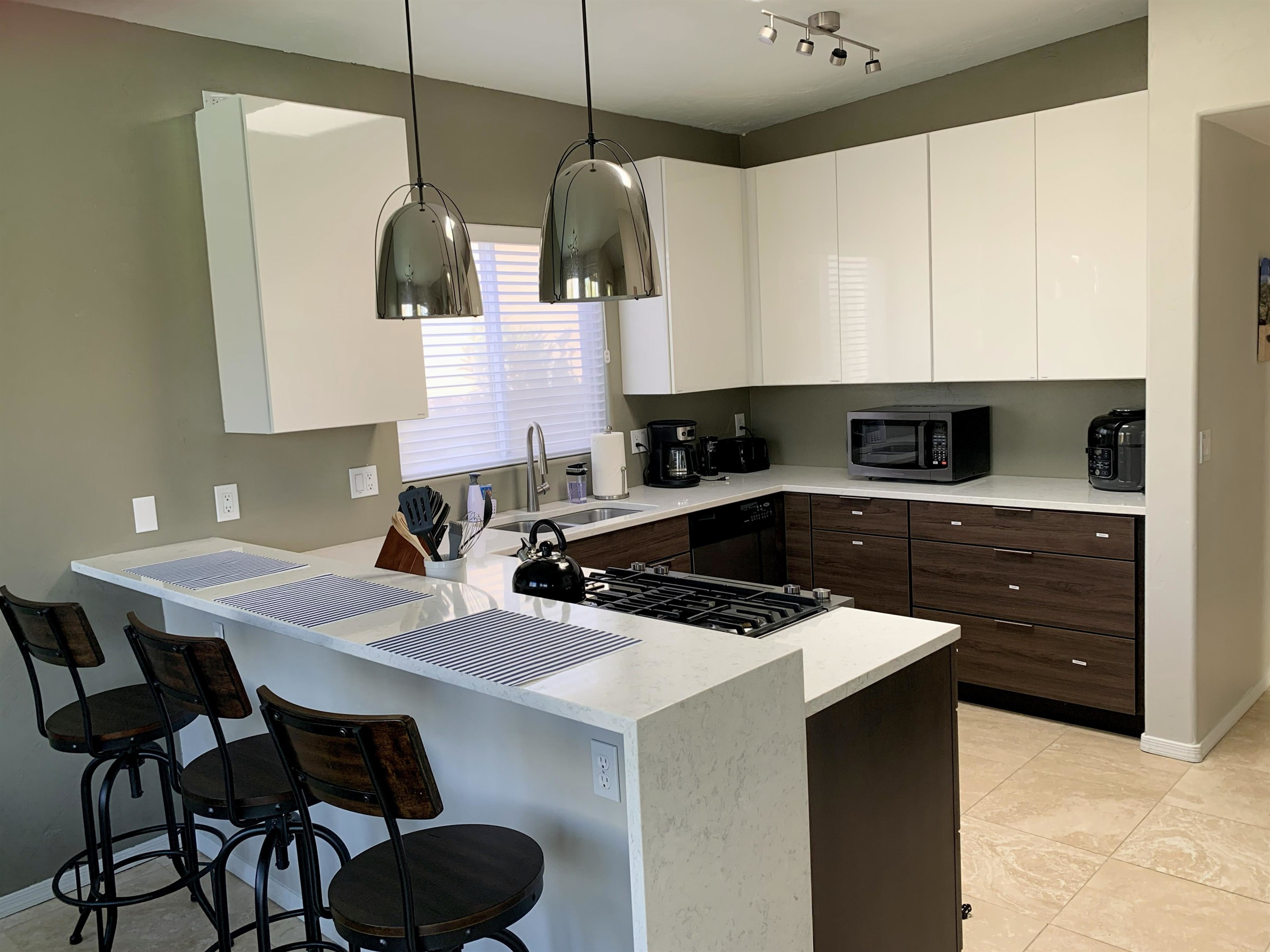 Modern kitchen is well equipped to make meal preparation easy.