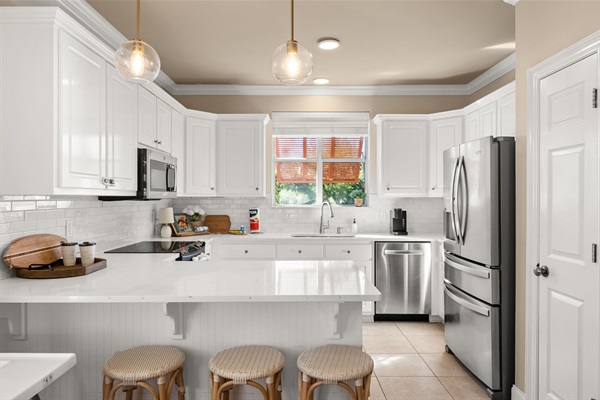 Bright, Fully Equipped Kitchen with Island Seating