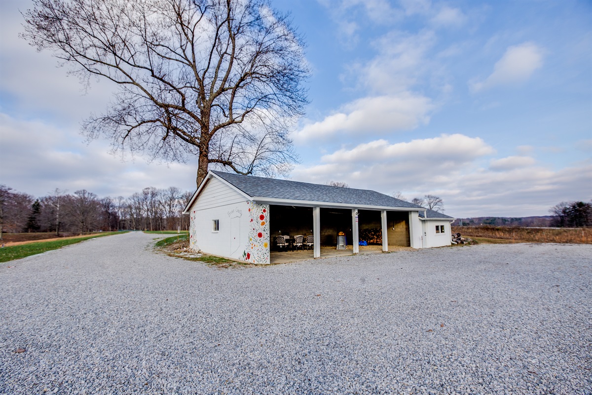 The Farmhouse is the only house on a long, flat gravel drive.  There are two outbuildings.  The one pictured is the game barn (stocked for guests).  The green barn is not accessible to guests.