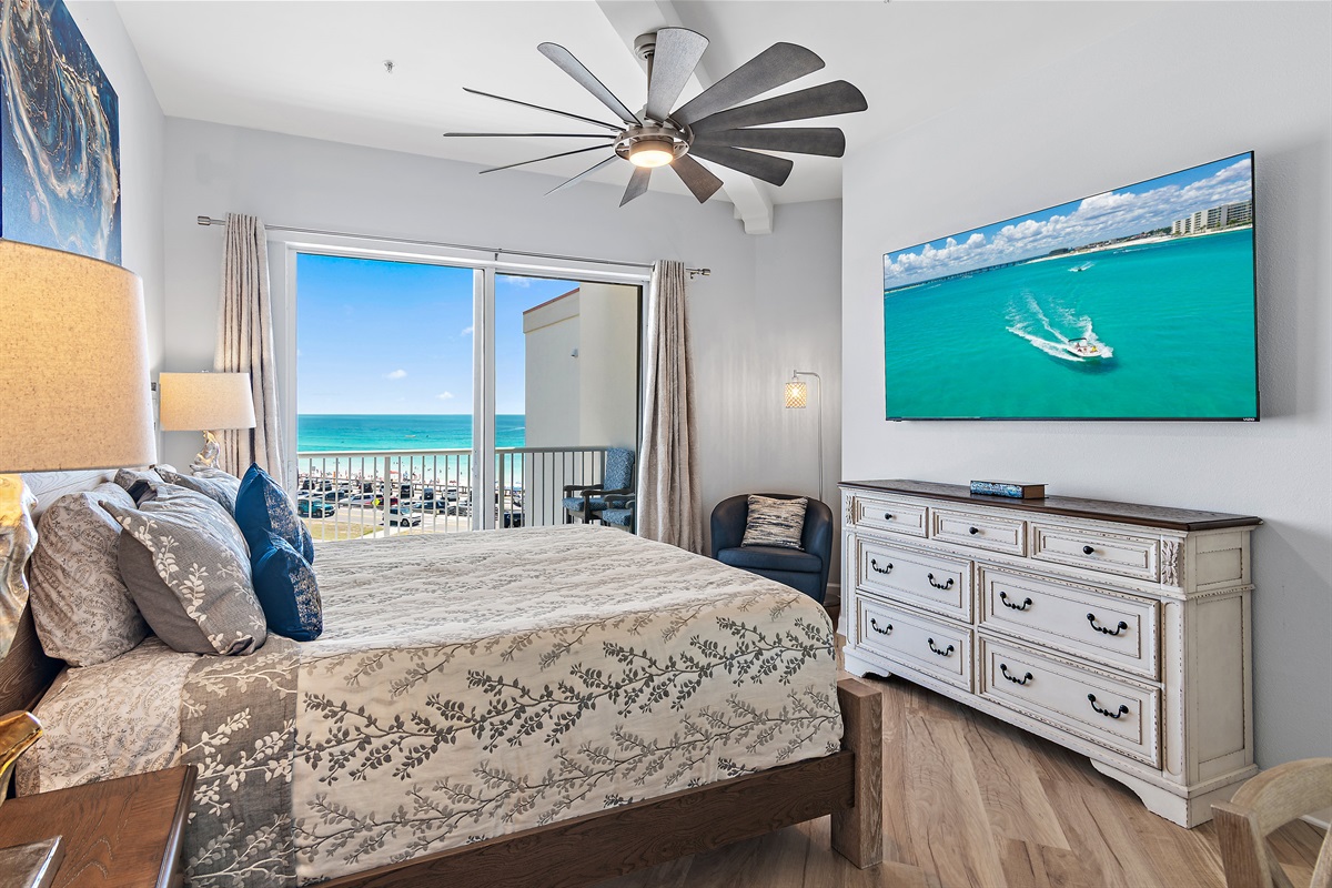 Gulf‑front master king bedroom with balcony access