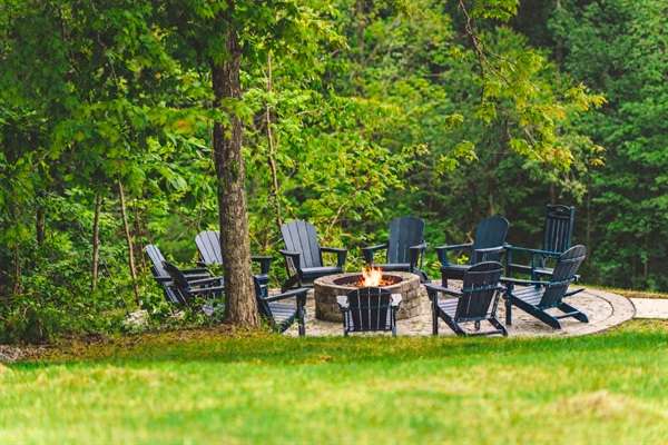 Fire pit nestled in the trees with amazing views.