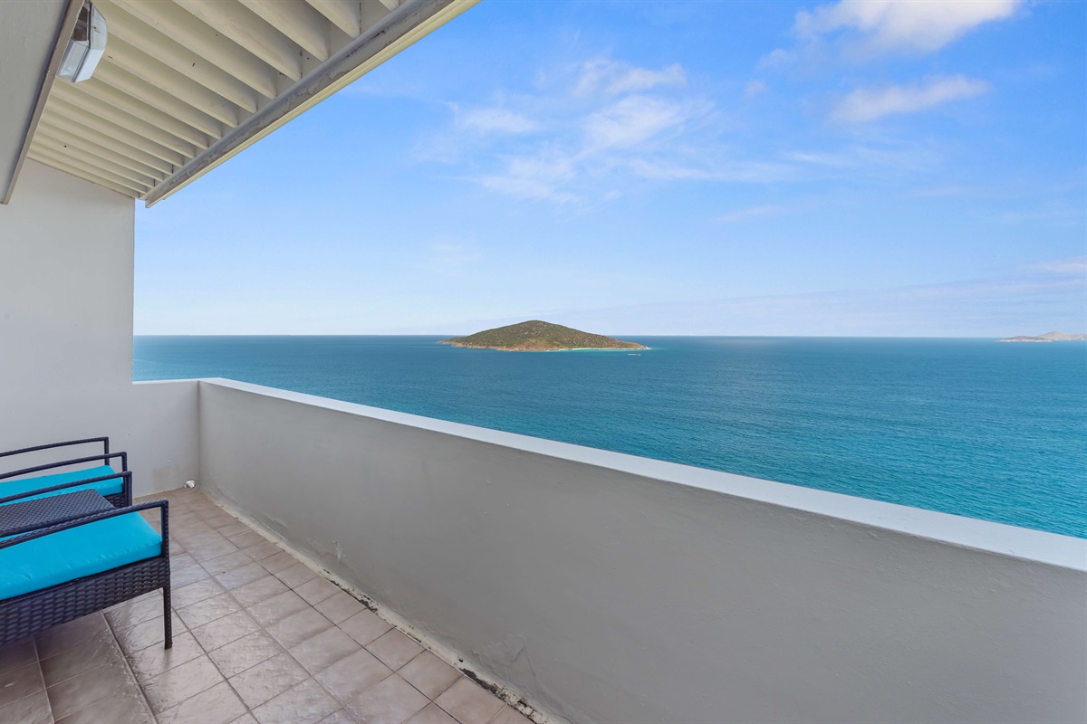 Balcony off of the primary bedroom: Watch the sunrise over St. John with coffee in hand; mornings here are magic.