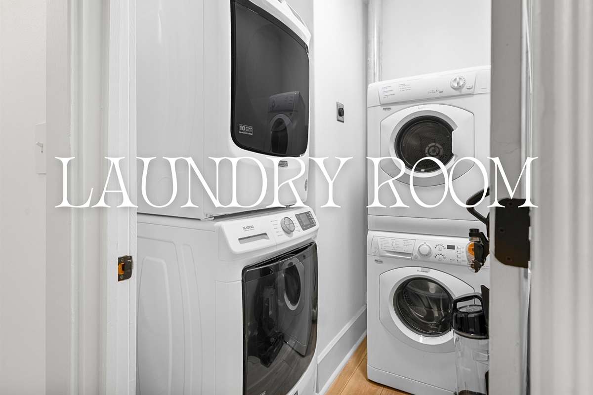 A laundry room with a stacked washer and dryer adds convenience, making it easy to keep your wardrobe fresh during your visit.