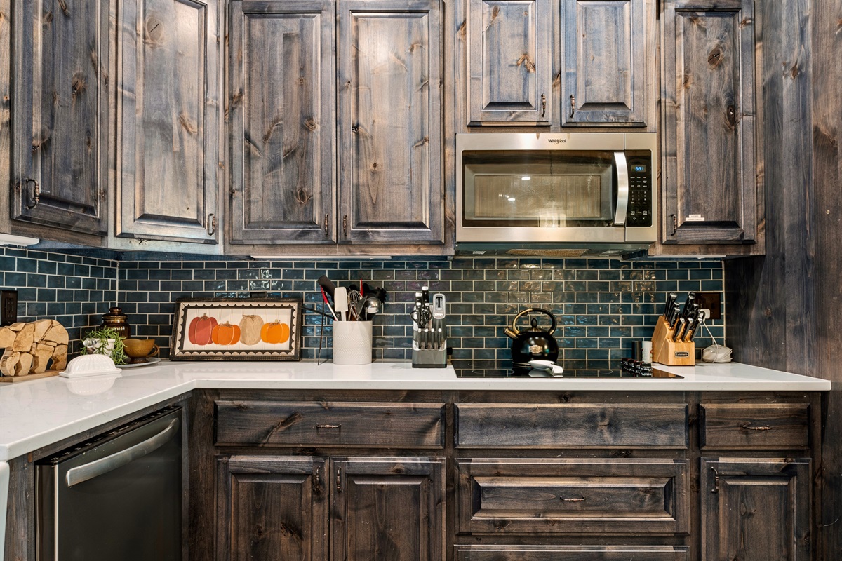 The large kitchen island provides plenty of space for cooking or gathering around with friends and family.