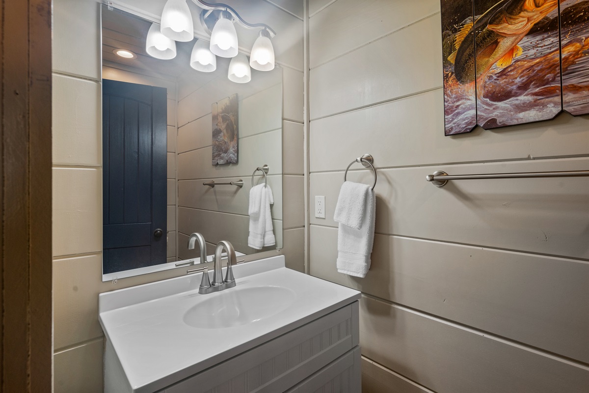 Pool room has a private powder room.