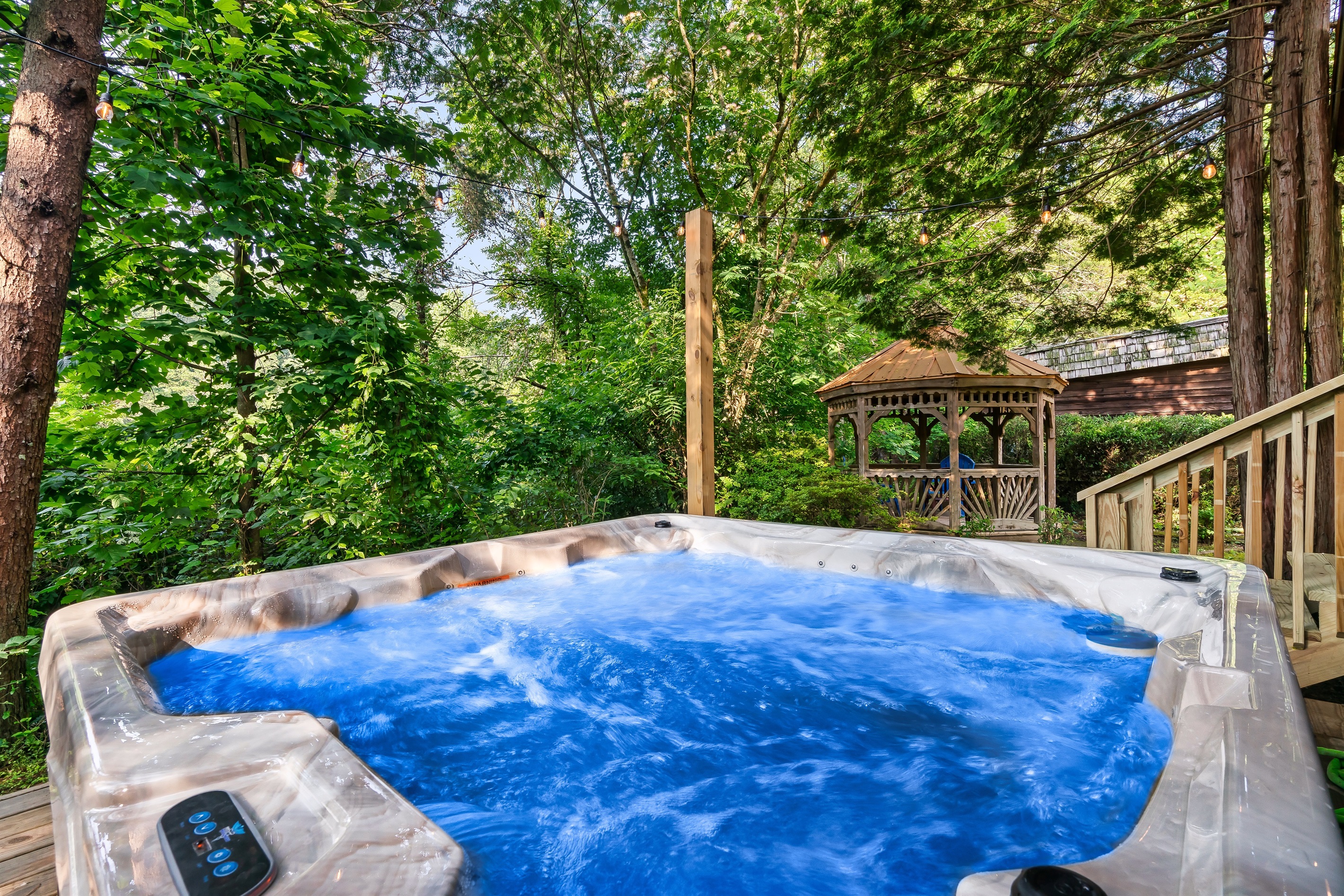 Soothe your body and soul in our inviting hot tub retreat.