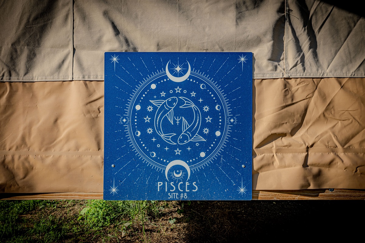 When you see this sign on the back of the tent, you'll know you've arrived.