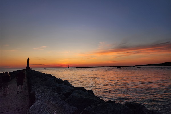 Catch a stunning sunset at Pere Marquette Beach