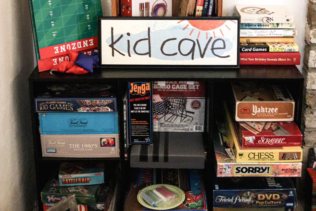 KID CAVE - A dedicated lower-level game room featuring air hockey, Ms. Pac-Man, board games, toys, books, a record player, and plenty of space for kids—and kids at heart—to unplug, play, and make memories together.