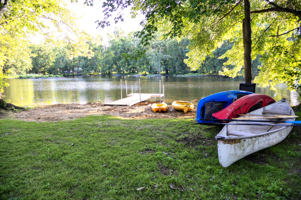 Our private beach with kayaks, canoe, paddleboards, and space to slow down. Unlike the busy, high-traffic lakes, the river offers a calmer place to paddle. Beach installed end of June until the first frost. 