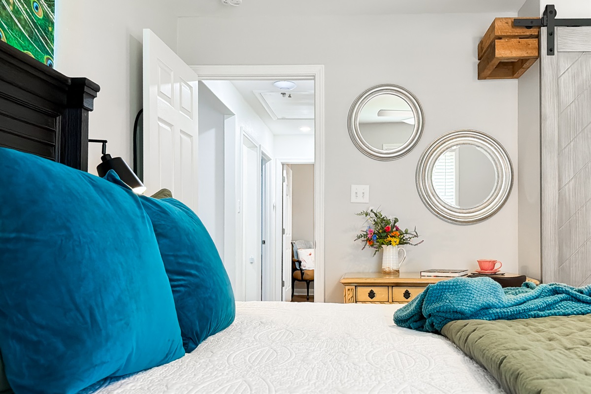 Just across the hall is the second bedroom.