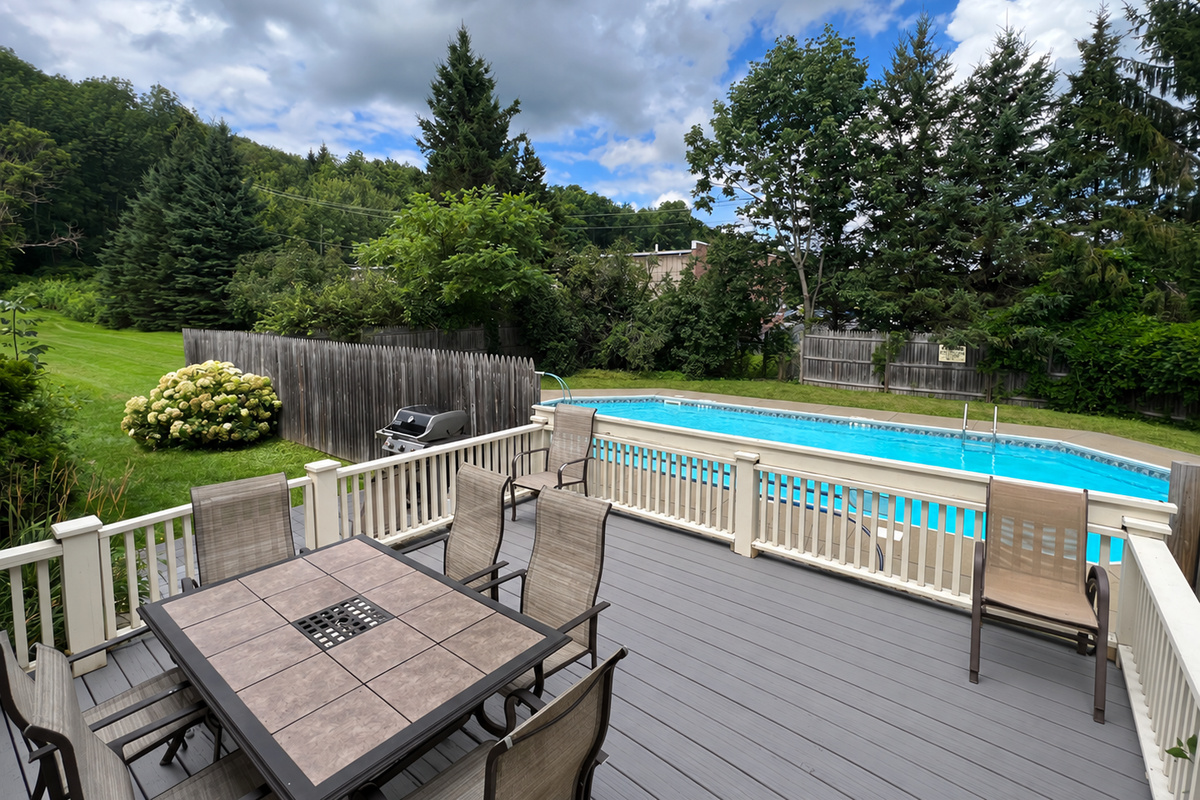 The Federal House side deck off kitchen leading to grill area and pool.