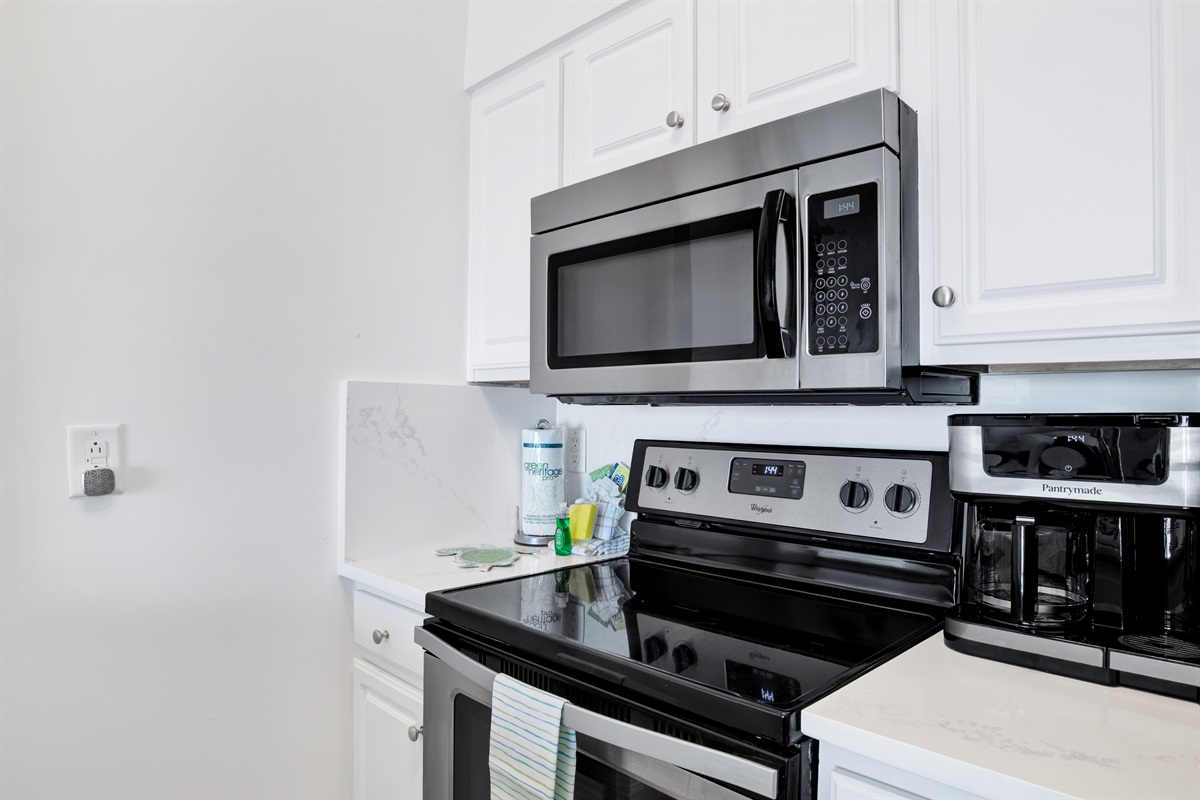 Kitchen with stainless appliances and Gulf view