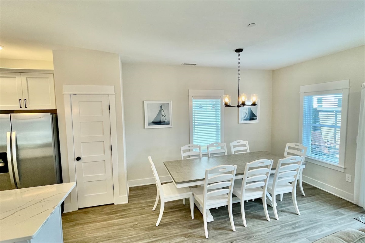 Spacious dining area ideal for group meals, comfortably seating 8–10 guests