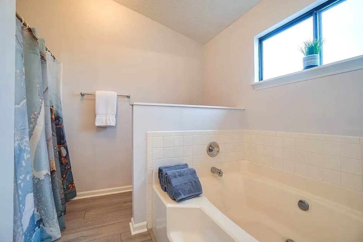 You get to choose after a long beach day &mdash; quick rinse in the separate shower or a slow soak in the garden tub. You deserve both.