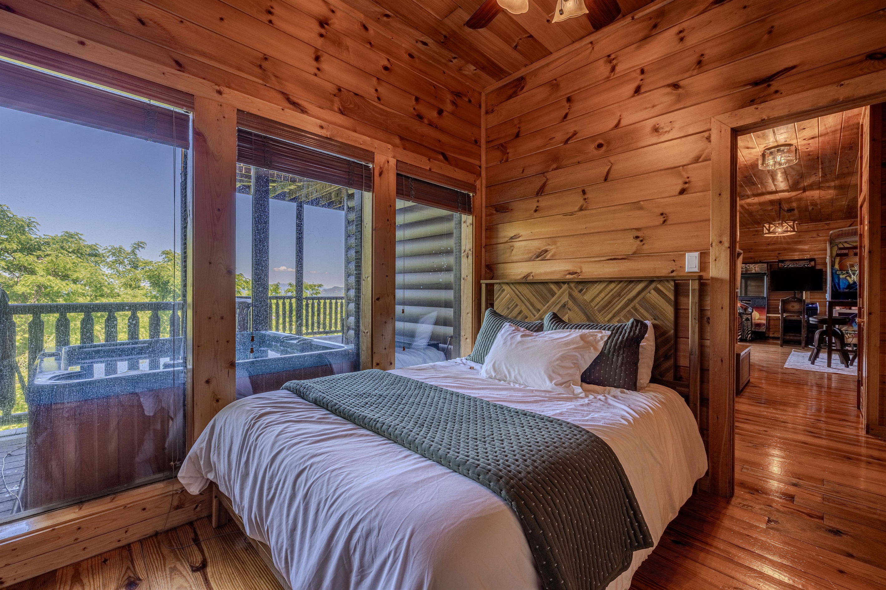 This connected space includes a bunk room with 4 twins and a separate bedroom with a queen bed