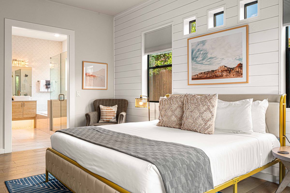 {Bedroom 1} This spacious king suite offers plenty of room to unpack, unwind and enjoy your own private retreat.