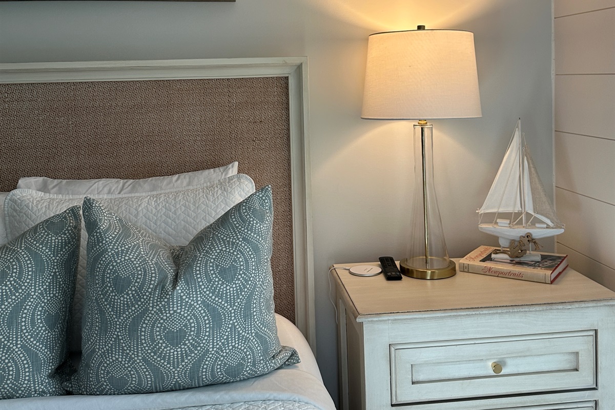 Spacious 2nd level queen bedroom suite with full ensuite bathroom, tiled shower, and a large vanity.