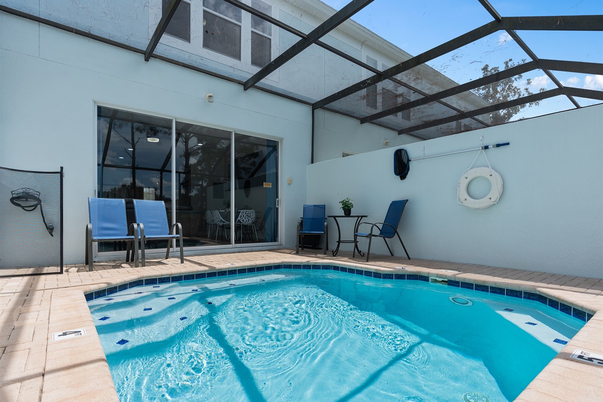 Private screened pool with lanai and no rear neighbors at Belle’s Villa