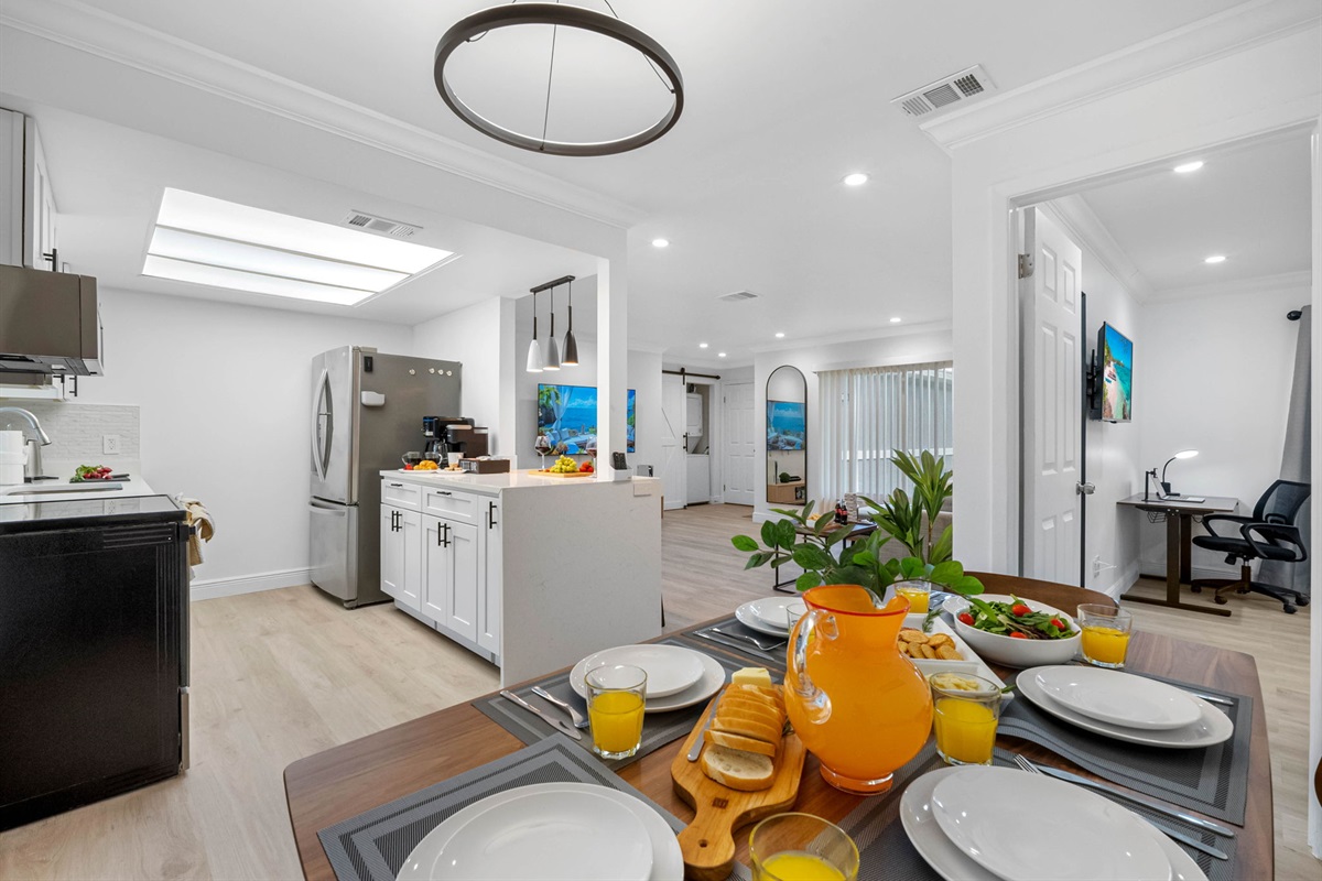 Gather around this cheerful dining space, filled with natural light and cozy vibes for every meal.