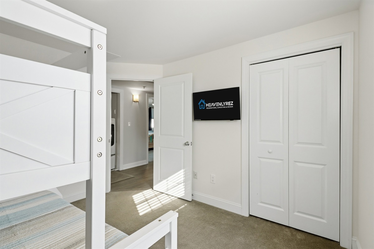 Twin-over-full pyramid bunk with trundle—perfect for groups