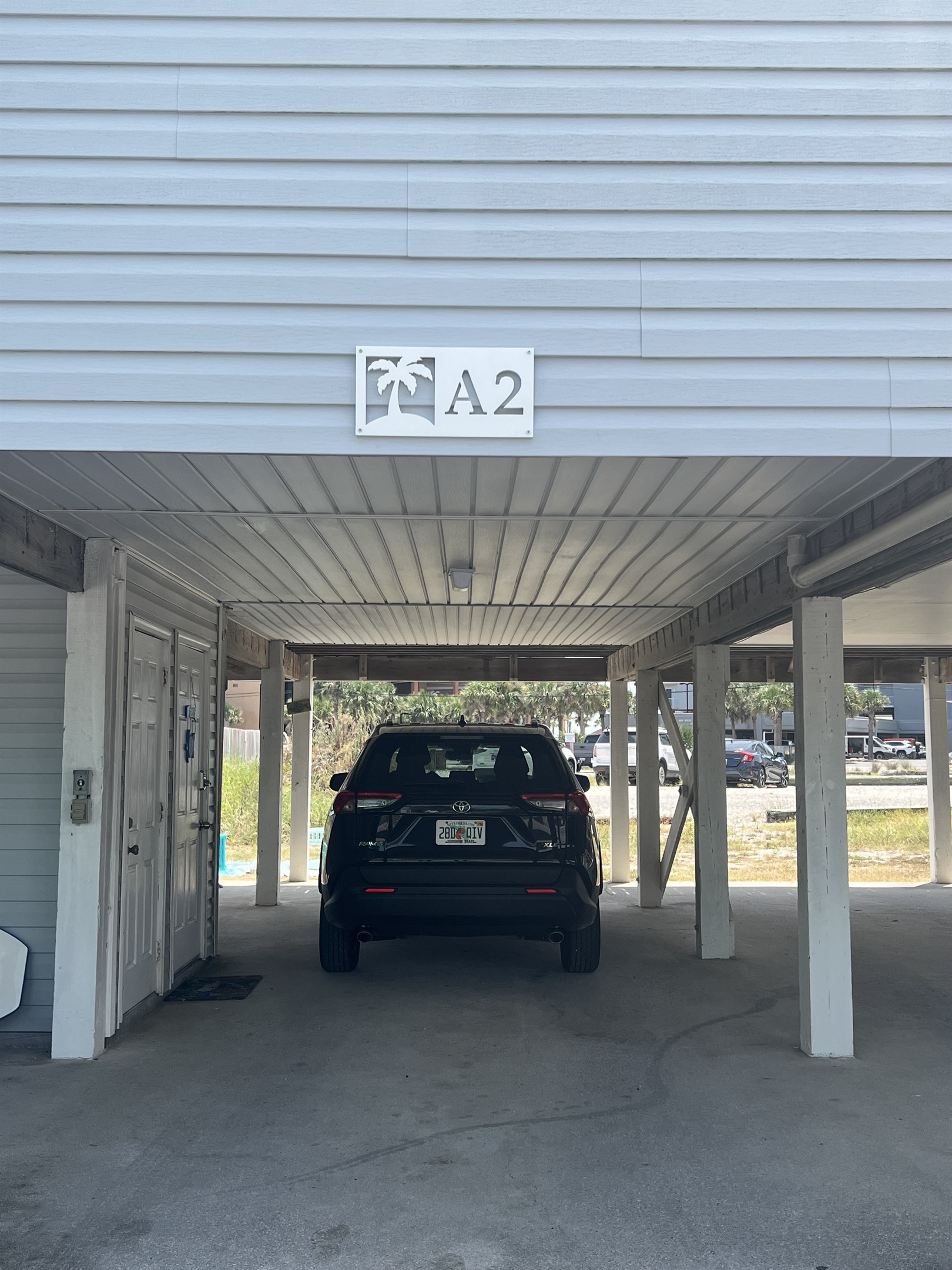 parking for two cars under house