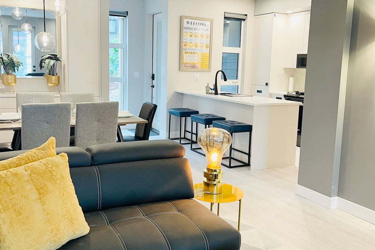 View from Living room into the Dining area and Kitchen. 