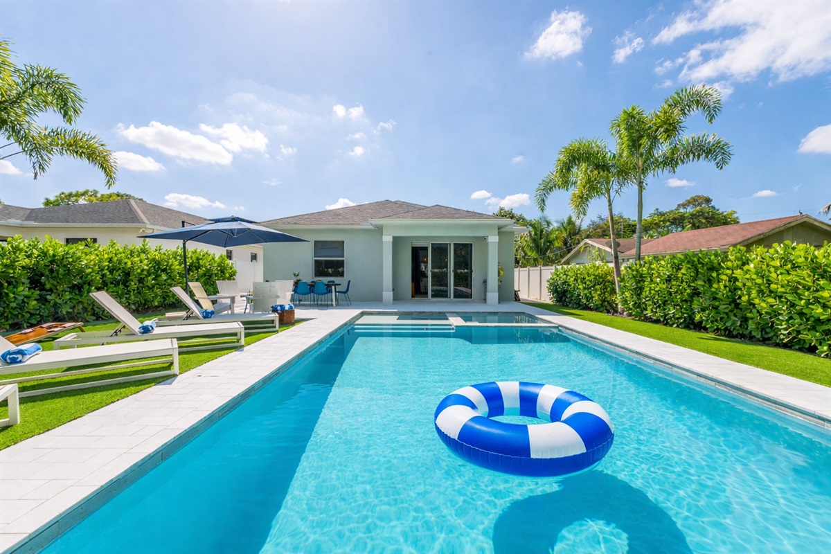 Welcome to our tropical outdoor paradise, where relaxation and outdoor enjoyment meet in perfect harmony. The centerpiece of this outdoor oasis is the large SALTWATER pool and hot tub, where you can cool off on hot days. BBQ and dine al-fresca!