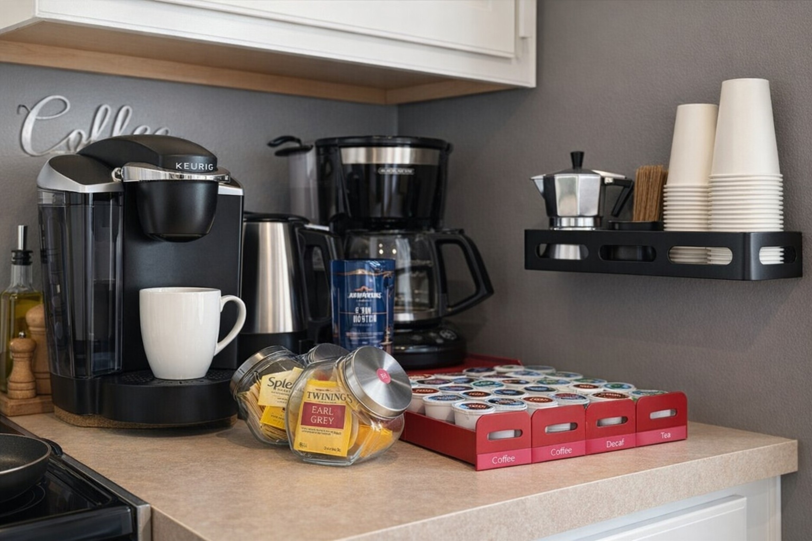 coffee and tea station with multiple brewing options and pods