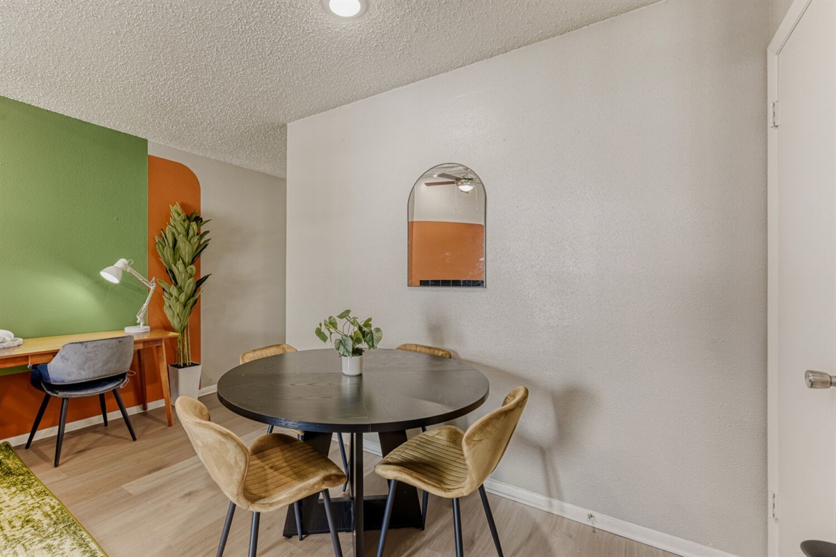 Modern minimalism meets retro charm — a cozy dining nook with warm tones and stylish simplicity.