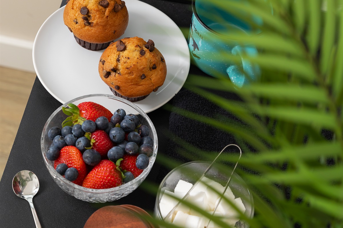 Start your day with a cup of coffee from either the downstairs dual pot or a cup from the upstairs Keurig coffee bar. 

Food for staging purposes only/not provided. 