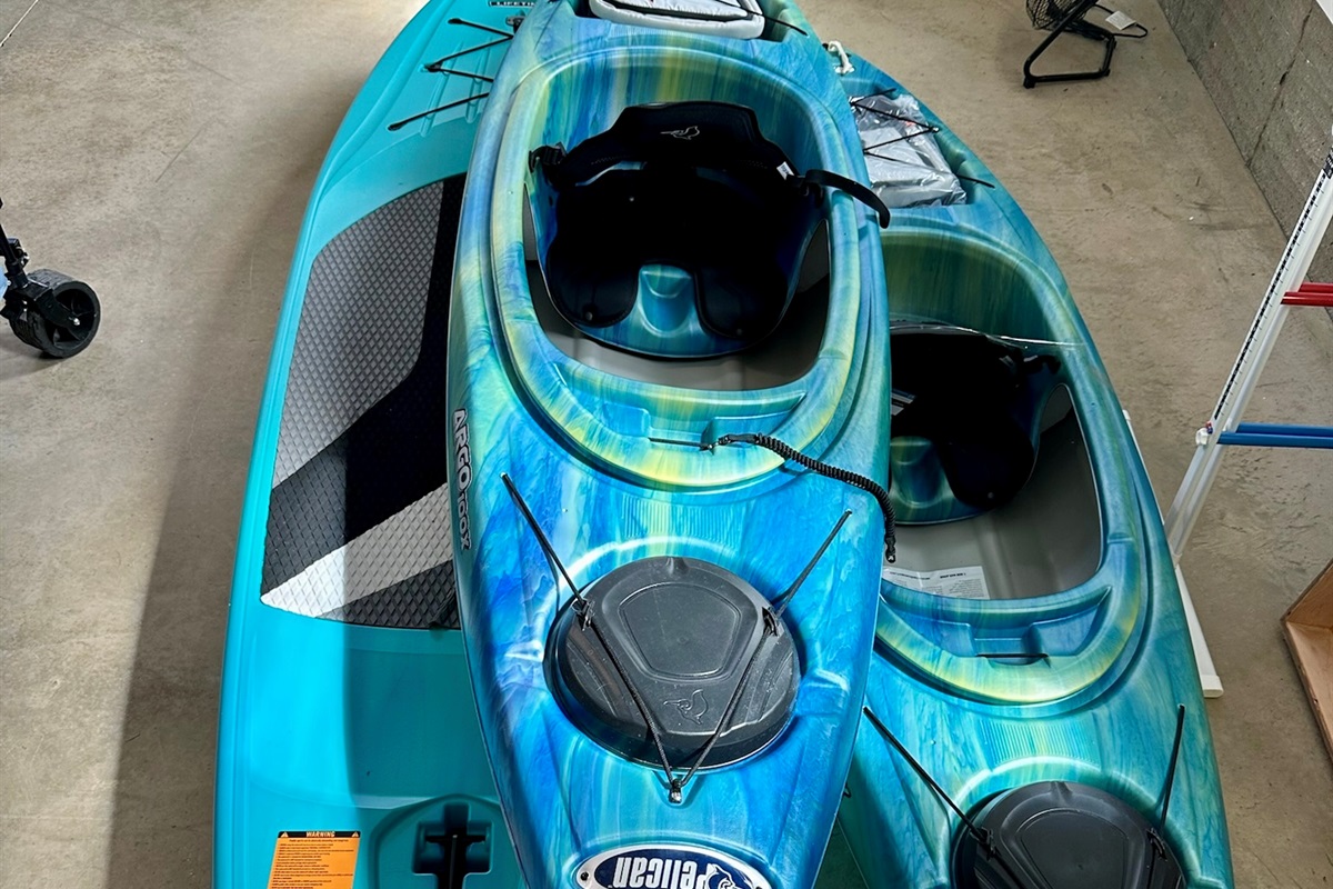 Paddle out and explore! Multiple kayaks and a paddleboard are provided so everyone can enjoy the lake together.