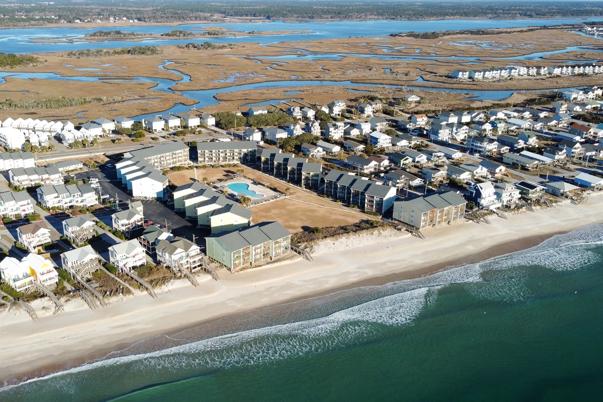 Aerial view of the condos and Surf City from the sea