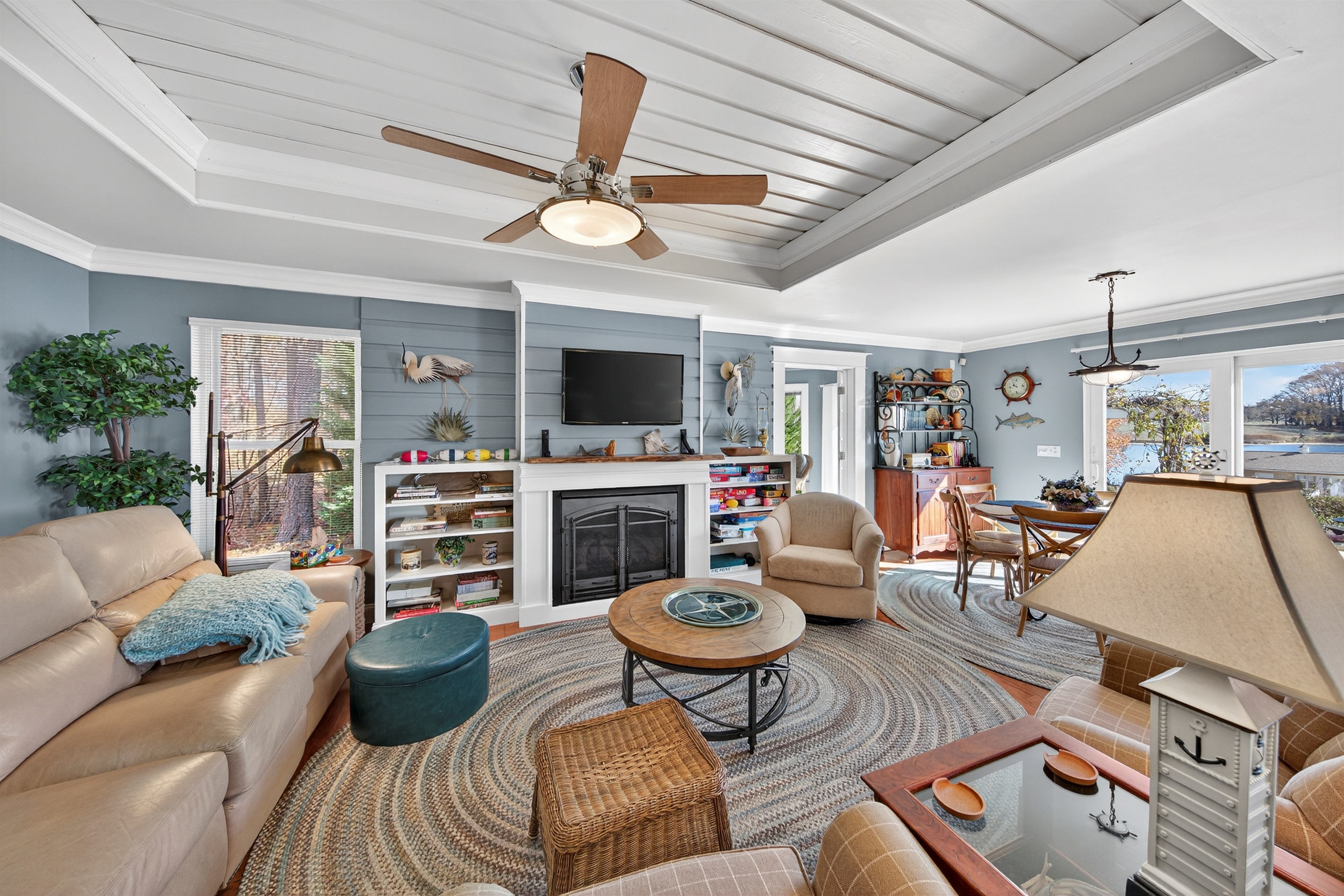 The living room opens into the sunroom, creating a welcoming extension of the main space, but providing a separate space for kids or adults..