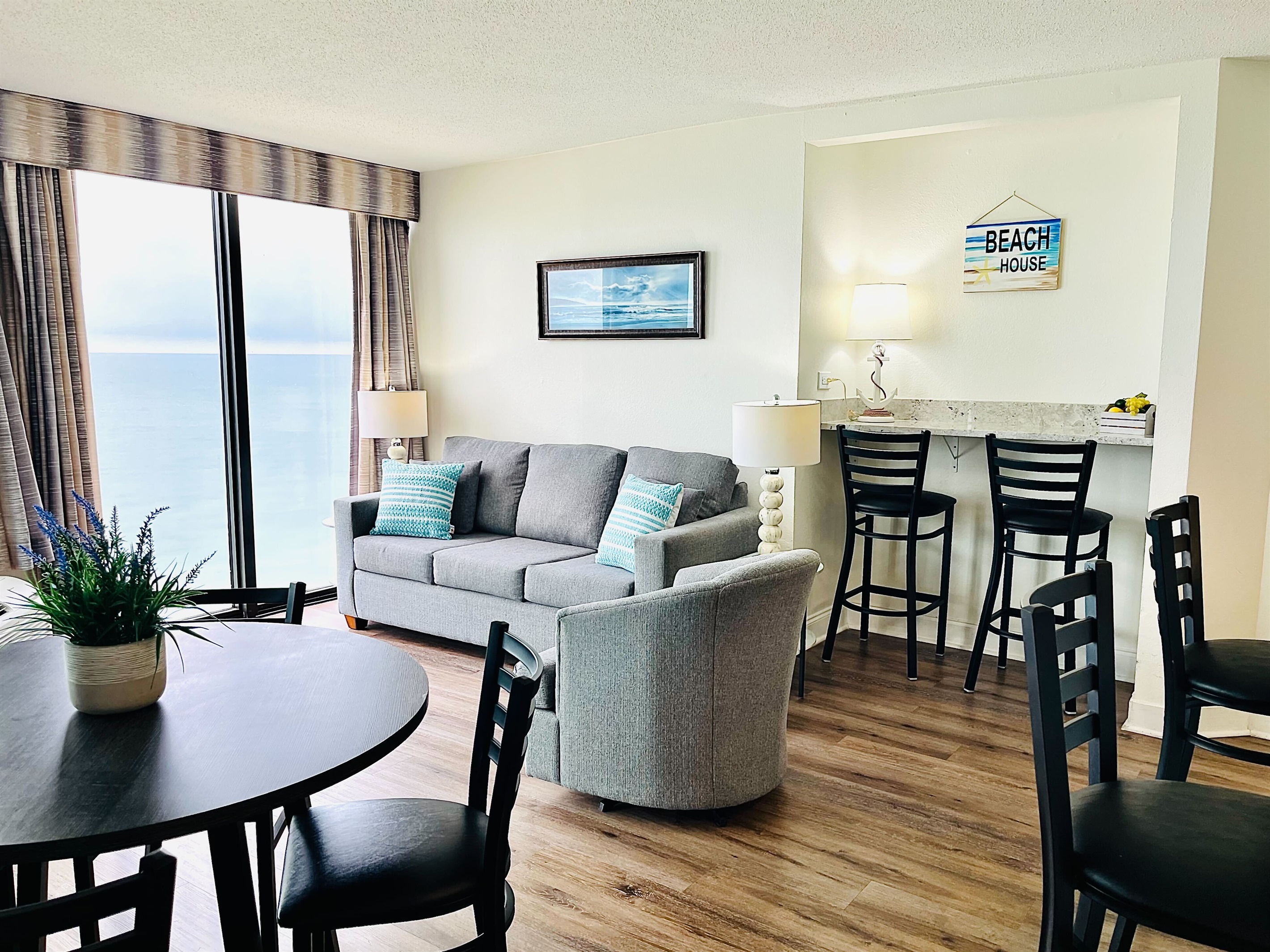 Immerse yourself in open-concept living, where the living area seamlessly transitions into the dining space, creating a spacious and welcoming environment for both relaxation and entertaining.