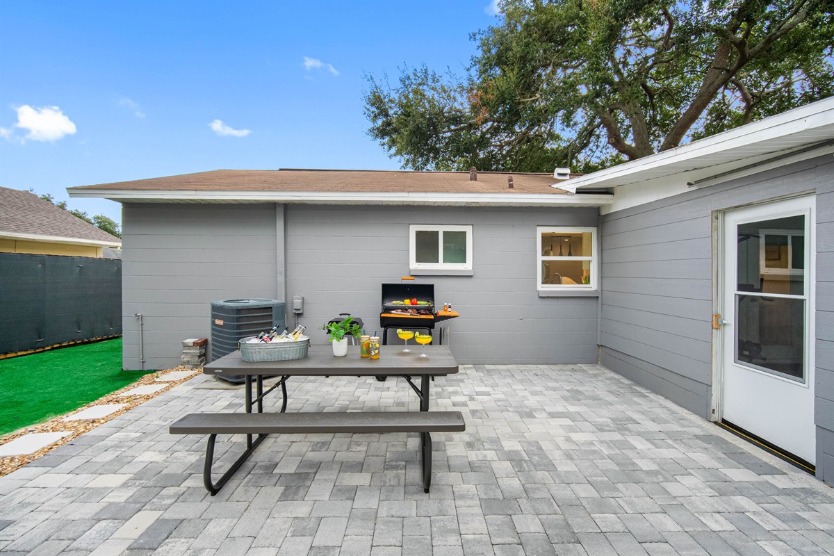 This grill setup with seating is your weekend relaxation station.