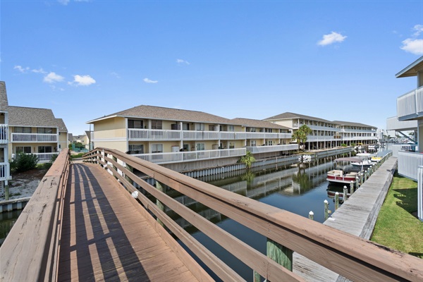 A boater's paradise! Look out from the small balcony to see the boat slips and saltwater canal activity happening right below you.