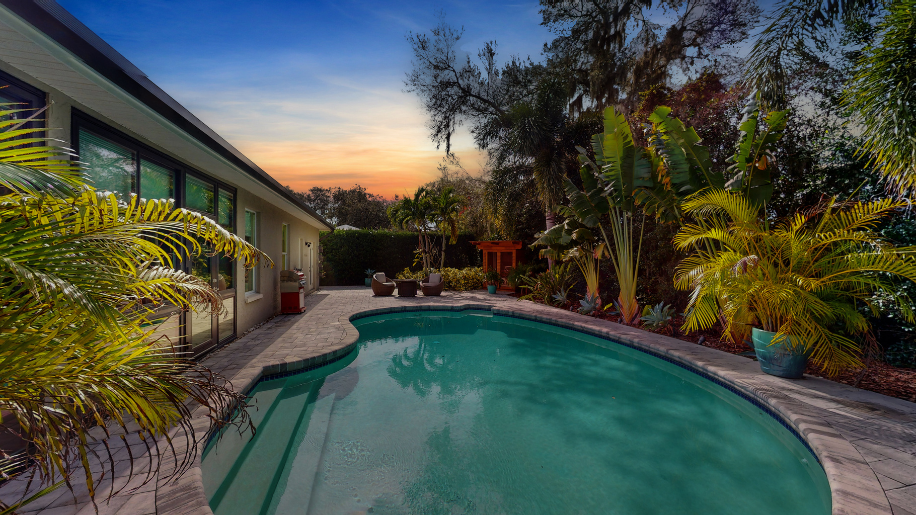 Sunset-lit pool perfect for unwinding year-round