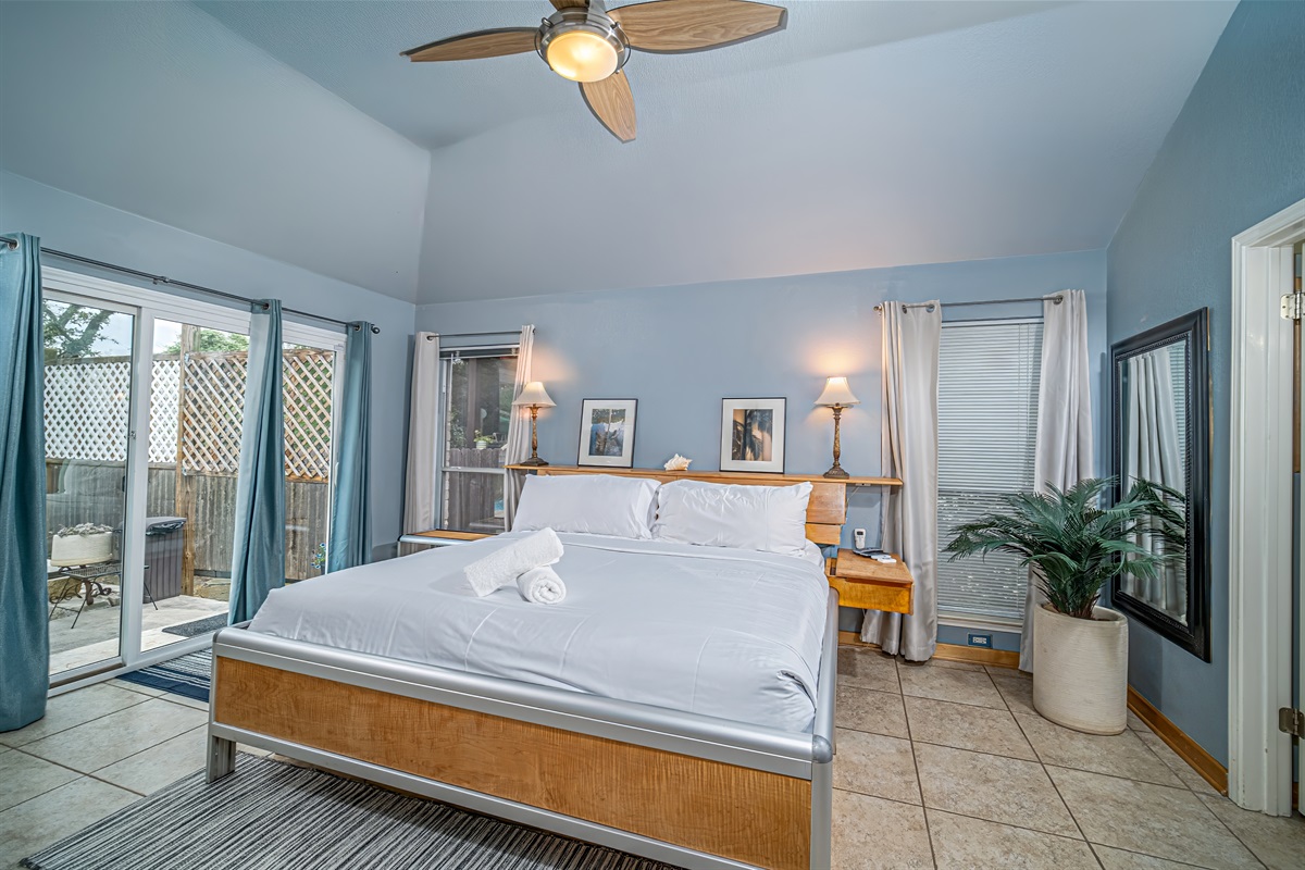 Master suite w custom king, dual zone, adjustable number bed w 2 remotes. View & access both pool & patio thru oversized, climate controlling sliding glass doors. Black-out drapes. Accent lighting, GFiber TV, ceiling fan in vaulted ceiling.