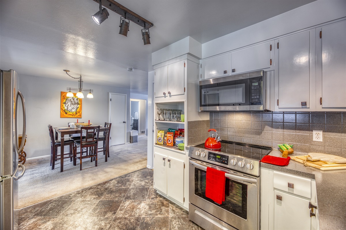 3 Full kitchens with Dining areas. - Suite 35A.