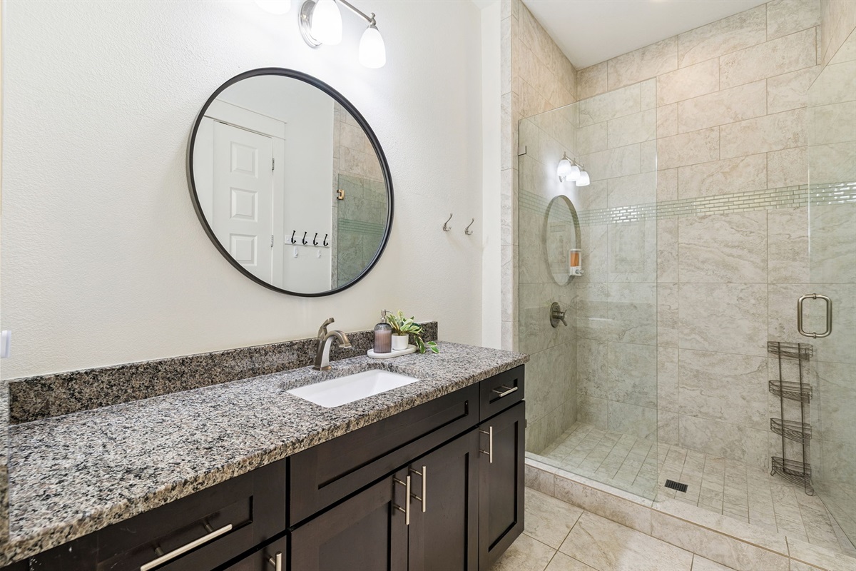 Take a moment to unwind in a private ensuite bathroom with all the essentials — your personal escape.