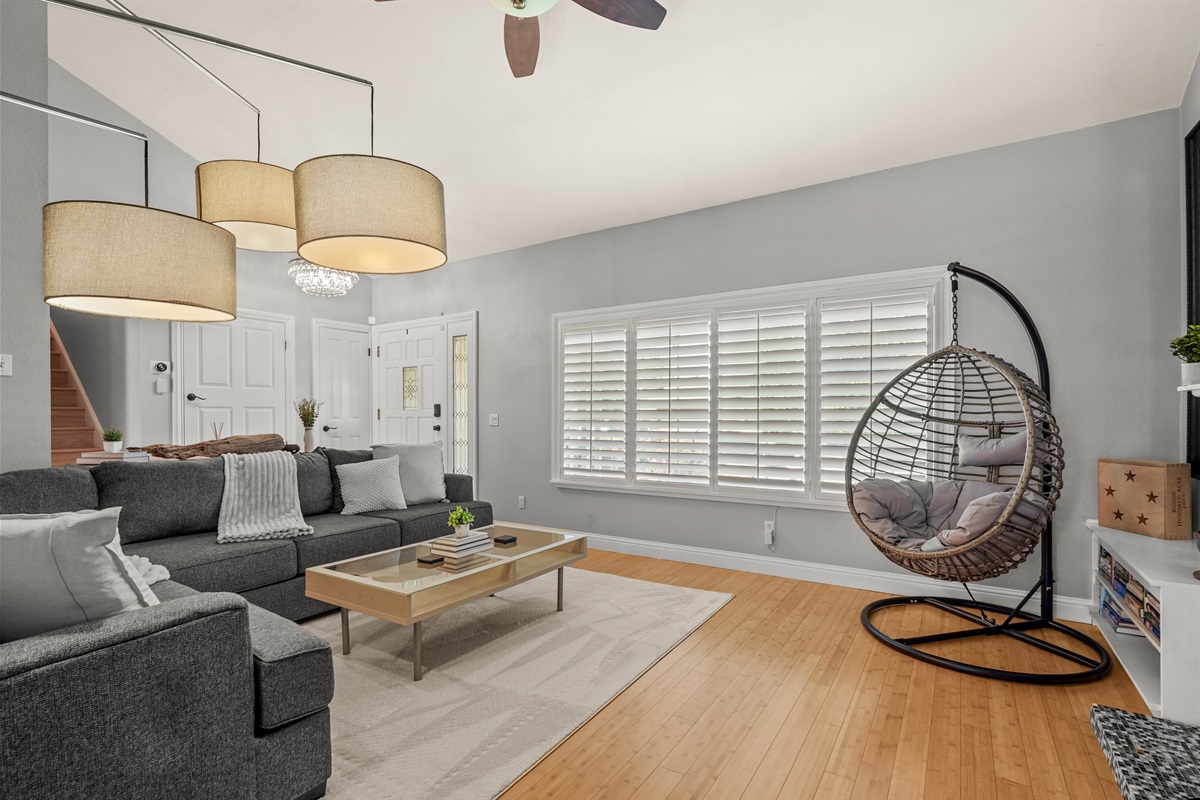Bright and comfortable living room with cozy seating, an open layout, and a Smart TV perfect for relaxing after a day exploring Napa Valley.