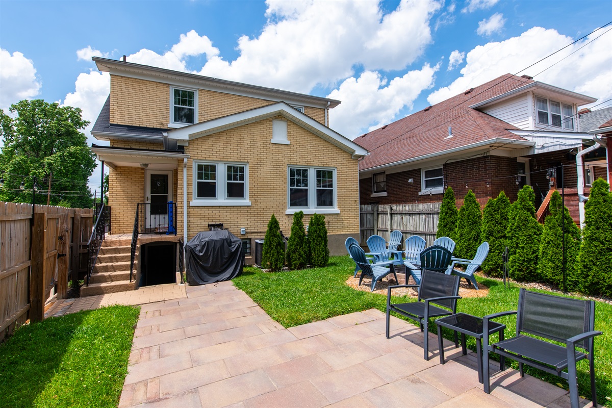 Backyard- features a gas grill, fire pit and hot tub