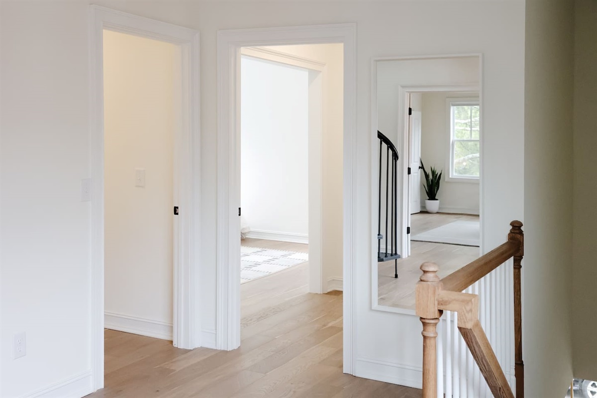 The landing provides additional space to get ready - featuring a floor length mirror. 