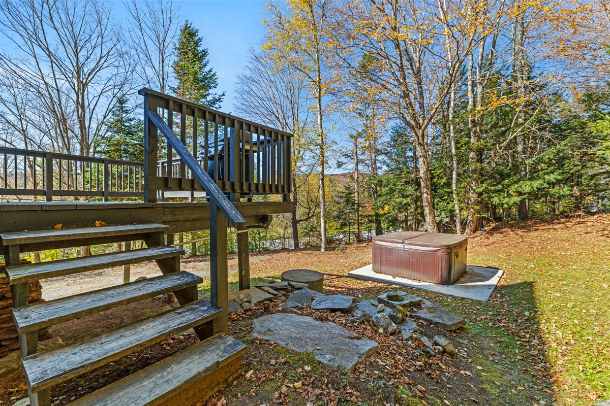 Outside, coming off the deck to the hot tub. 