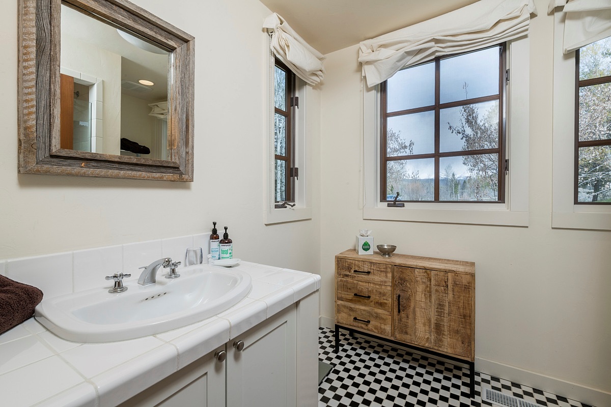 Upstairs Guest Bath with Separate Tub and Glass enclosed shower