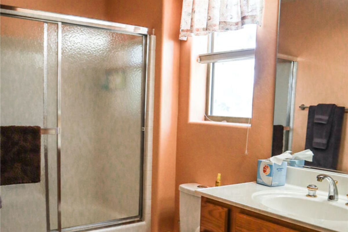 Bathroom 2 includes a tub/shower combo.